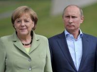 Меркель и Путин договорились по телефону о встрече в "нормандском формате"